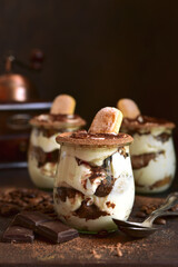 Delicious italian dessert tiramisu in a jars.