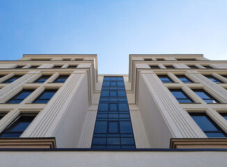 upward view or view of a modern building, blue sky background, poster or source