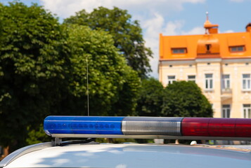Fototapeta premium Flashing lights on the police car close-up