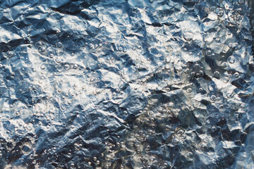 The bubbling of clear, transparent water