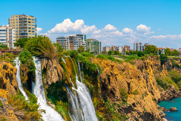 Lower Düden Falls drop off a rocky cliff falling from about 40 m into the Mediterranean Sea in amazing water clouds. Tourism and travel destination photo in Antalya, Turkey. © svetlanamarkova