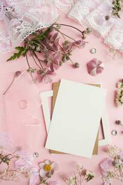wedding card mockup. bouquet of delicate chrysanthemums, wedding ring and white blank for text