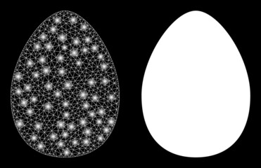 Glamour mesh vector egg with glare effect. White mesh, glare spots on a black background with egg icon. Mesh and glare elements are placed on different layers.