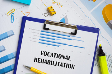 Financial concept about Vocational Rehabilitation with sign on the sheet.
