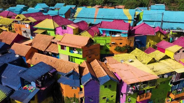 MAgnificent Aerial View of the Rainbow village Jodipan, Kampung Wisata Jodipan, a colorful village located in Malang, East Java, Indonesia