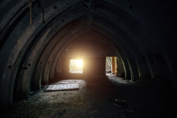 Fototapeta na wymiar Abandoned underground depot in Soviet military base