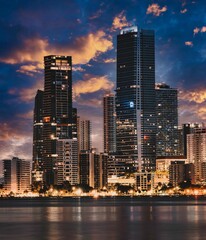 Naklejka premium Miami Florida city skyline at night sunset skyscrapers panorama beautiful Brickell urban buildings business luxury tower 