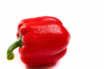 Ripe red bell pepper paprika on white background