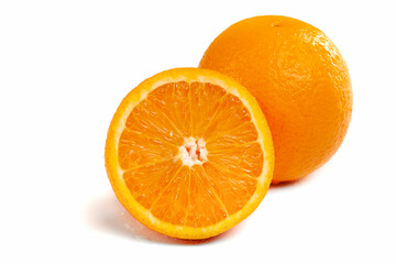 Orange close-up on a white background, cut and whole