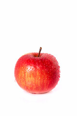 Ripe apple close-up on a white background.
