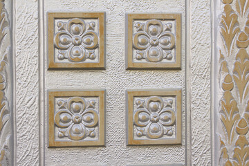 It is a pattern engraved on an iron door.