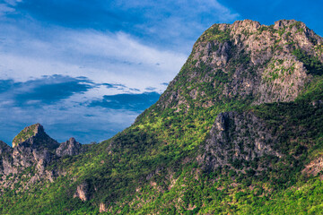 panoramic background of high mountain scenery, overlooking the atmosphere of the sea, trees and...
