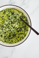 vegan creamed spinach with dairy-free sauce, healthy plant-based food