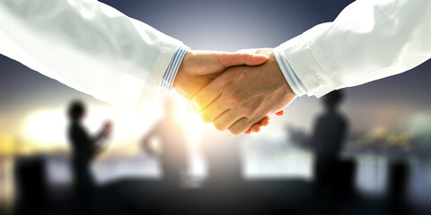 Partnership concept. Image of handshake . Mixed media . Mixed media