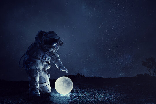 Astronaut and moon . Mixed media . Mixed media