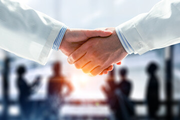 Partnership concept. Image of handshake