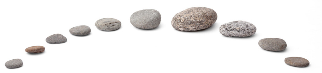 Fototapeta na wymiar Isolated, Zen stone and pebbles arranged into a semi-circle
