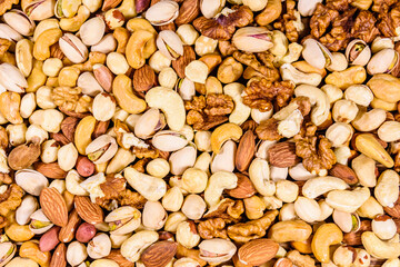 Background of the various nuts (almond, cashew, hazelnut, pistachio, walnut). Vegetarian meal. Healthy eating concept
