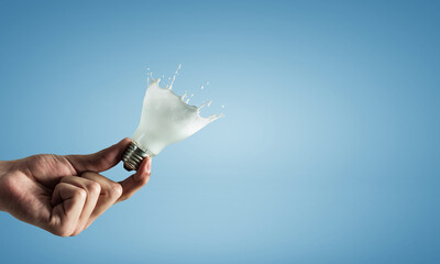 Light bulb with white glass splash