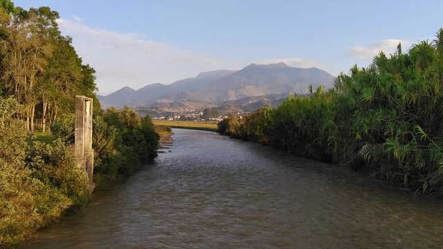 Timelapse on the Penderisco River in Urrao Antioquia with the paramo del sol in the background on a beautiful morning