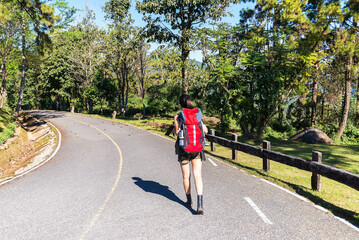 Young asian woman enjoying backpacker tourist to travel in wild trip hiking during .Travel concept. Freedom concept. Travel Concept.