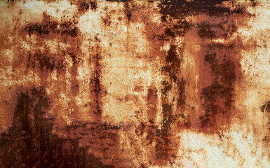 Old rusty iron surface with rust spots and cracks close-up as a background, copy space.