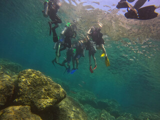Tourists scuba dive Mediterranian Sea. Marmaris,Turkey.