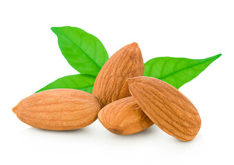 Close-up of almonds with leaves, isolated on white background
