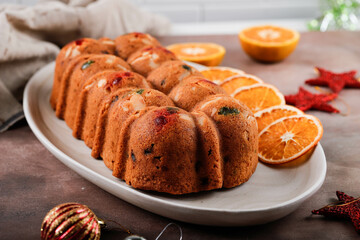 Delicious Homemade English Fruit Cake Loaf Pudding with Dried Mixed Fruit, Sultanas, Raisins, and Chopped Almond. Served during Christmas Party or New Year Eve