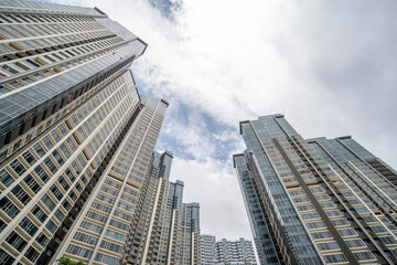 Fototapeta na wymiar Look up at the city's tall buildings