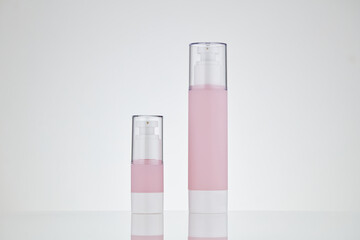 Set pink cosmetics product on white background. Cosmetics packing mockup with copy space. The blank empty for design. 