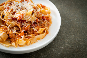 Homemade pasta fettuccine bolognese with cheese