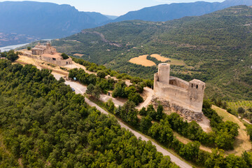 Fototapeta na wymiar Aerial view of Mur castle in Castell de Mur municipality in northeastern Spain, province of Lleida, Catalonia