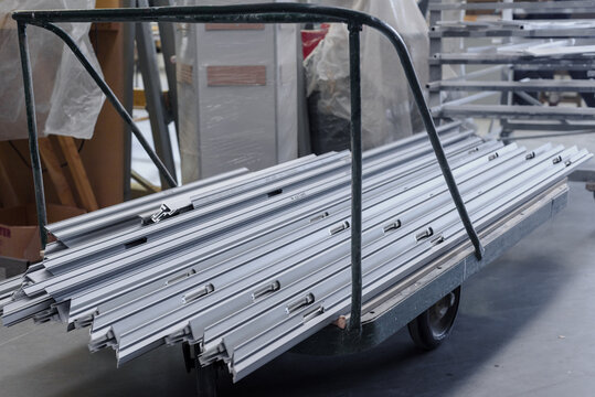 Transportation of aluminum profile piles on industrial metalwork plant