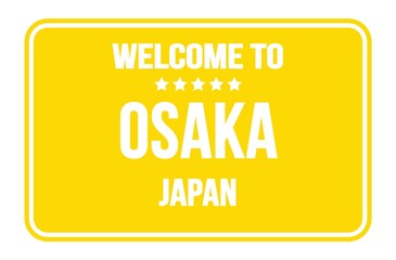 WELCOME TO OSAKA - JAPAN, words written on yellow street sign stamp