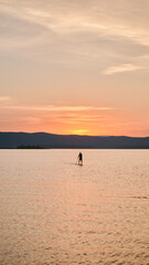 Sportsman paddling the standing board