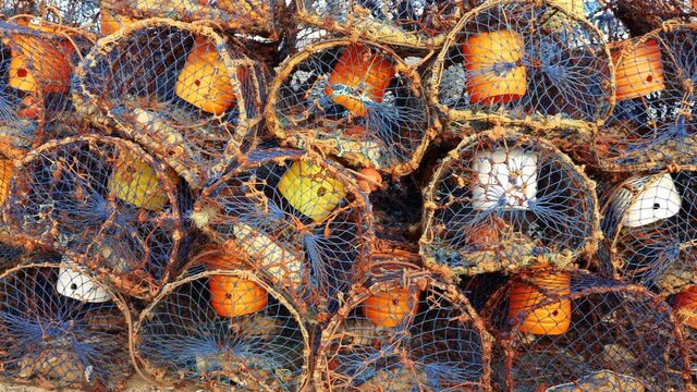Pile of traditional crab, lobster traps at the harbor of Essaouira, Morocco.