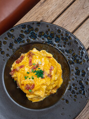 Thai omelet with bacon and onion spring. Flat-lay or a top-down shot of Thai typical food.