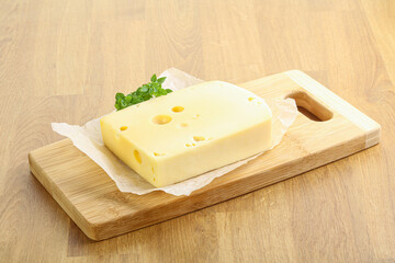 Maasdam cheese over the board