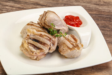 Grilled pork tenderlion with tomato sauce