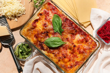 Composition with tasty vegetable lasagna on table