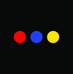 Three primary colours dots on black background.