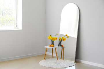Stylish interior of modern room with mirror