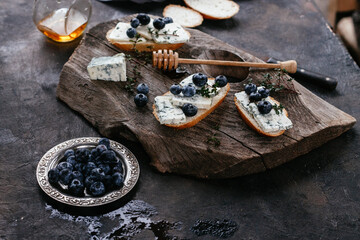 sandwiches with blueberry cheese and honey