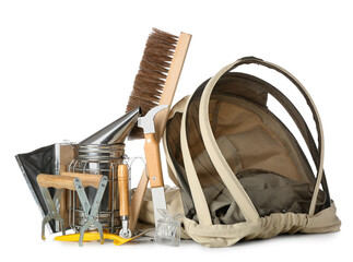 Set of beekeeping supplies on white background