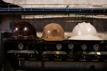 Historical mine helmets in the Cogne mine