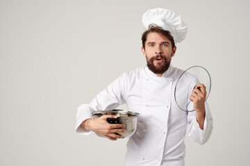 male chef pot in hands work service cooking