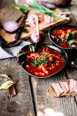 Ukrainian red borscht in a black plate