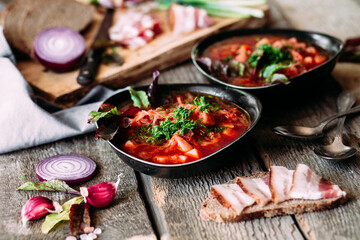 Ukrainian red borscht in a black plate