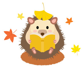 読書の秋に本を読むハリネズミ